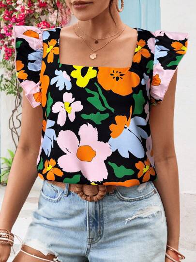Damebluse med flæsekanter og blomstermotiver Stilla