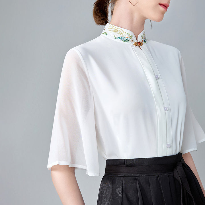 Dame elegant bluse med blomsterbroderier og gennemsigtige ærmer Stilla