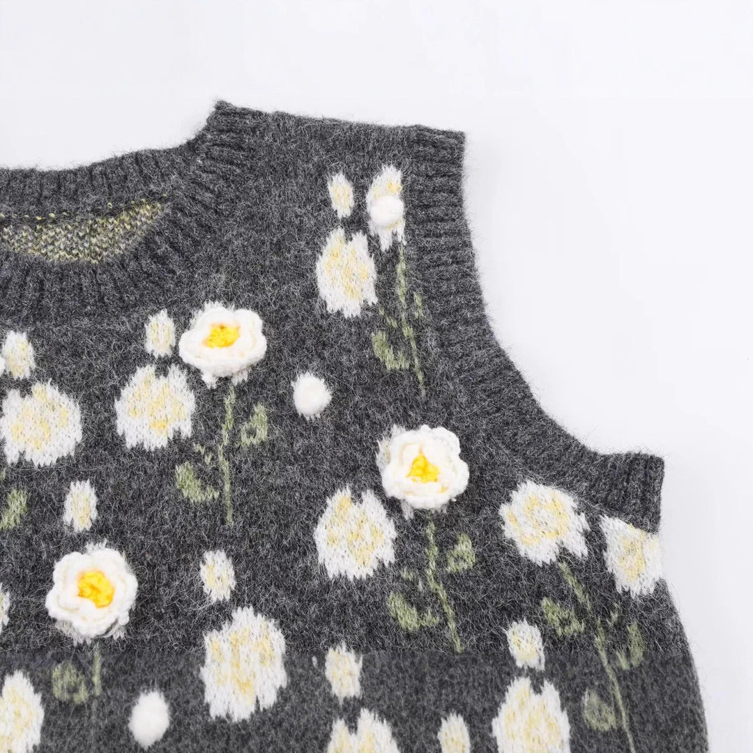 Dame strikvest med florale applikationer Stilla