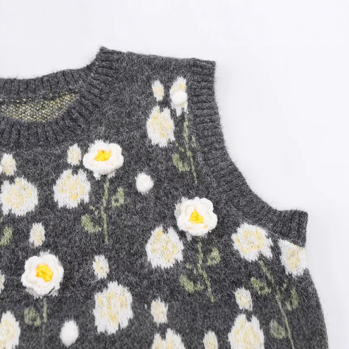 Dame strikvest med florale applikationer Stilla