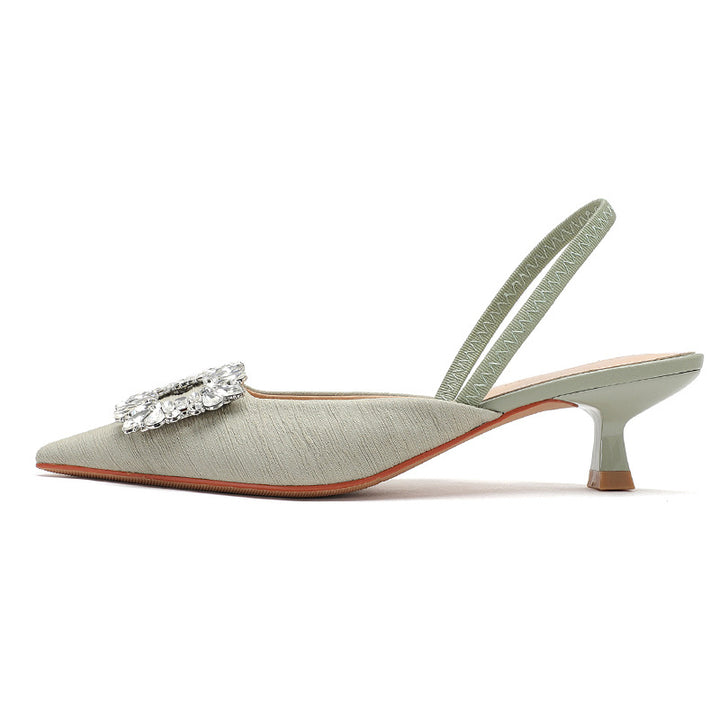 Femme Elegante Slingback-hæle med dekorativt blomsterdetalje Stilla