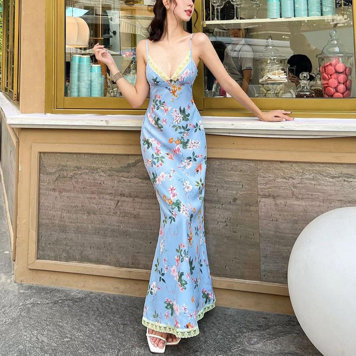 Dame maxikjole med blomstermønster og elegant rygudskæring Stilla