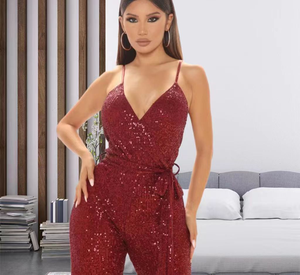 Dame jumpsuit med funkende paletter og dyb V-udskæring Stilla