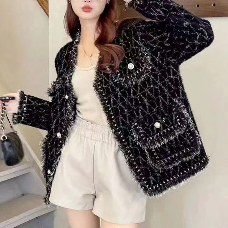 Kvinders fluffy cardigan med elegante knapdetaljer og dekorativ kant Stilla