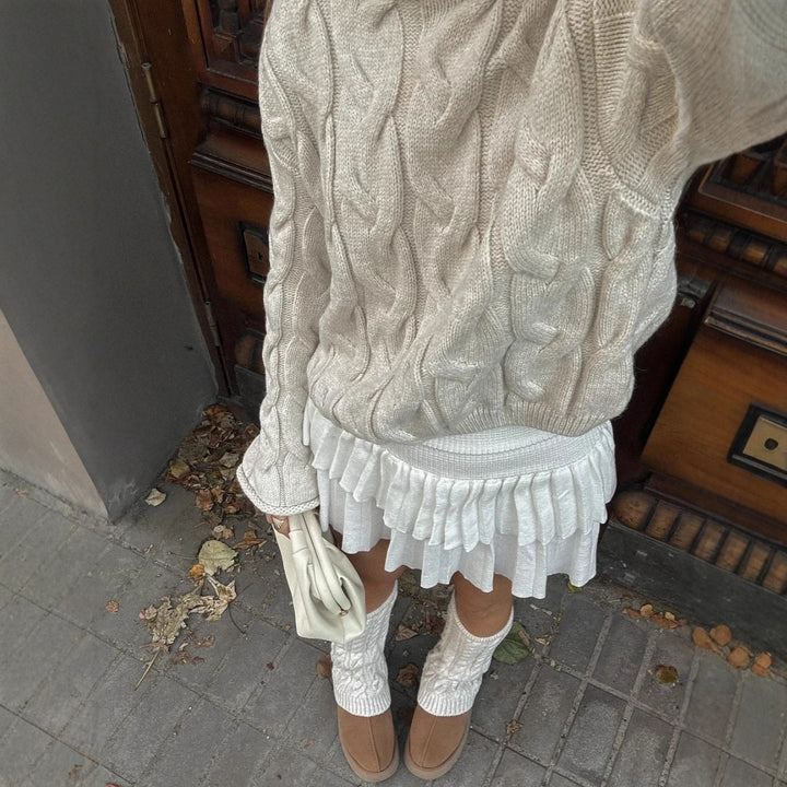 Kvinders chunky strikket sweater med fashionable kabeldesign Stilla