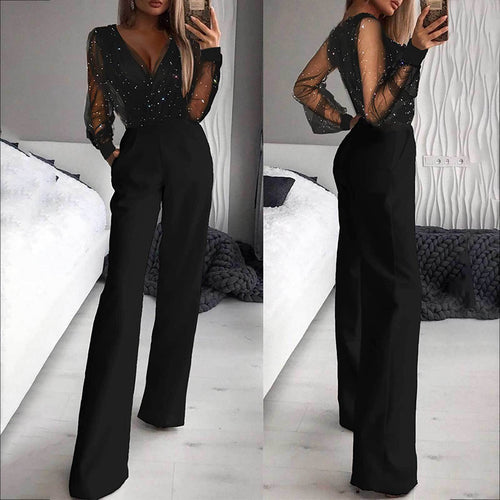 Damernes elegante jumpsuit med transparente ærmer og glitrende detaljer Skovae