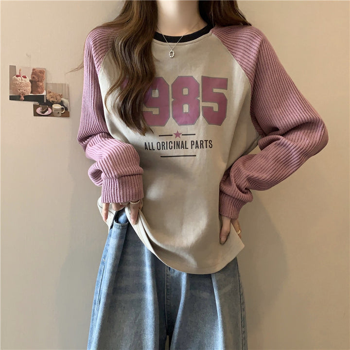 Femme Relaxed Fit Grafik Sweatshirt med kontrast ribærmer Stilla