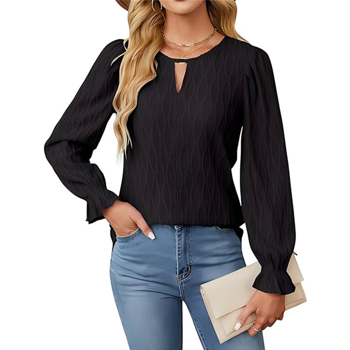 Dame indpakningsbluse med raffineret strukturdesign og elegante puffærmer Stilla