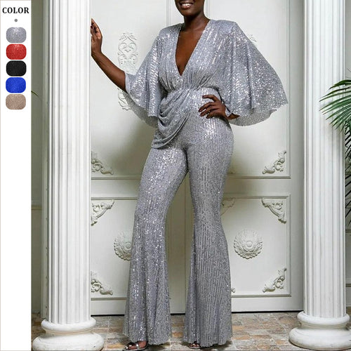 Dame glamourøs jumpsuit med glitrende paletter og vidde ben Stilla