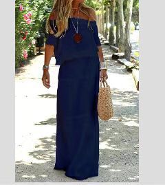 Dame Off-Shoulder Maxikjole med flydende snit og elegante volangdetaljer Stilla