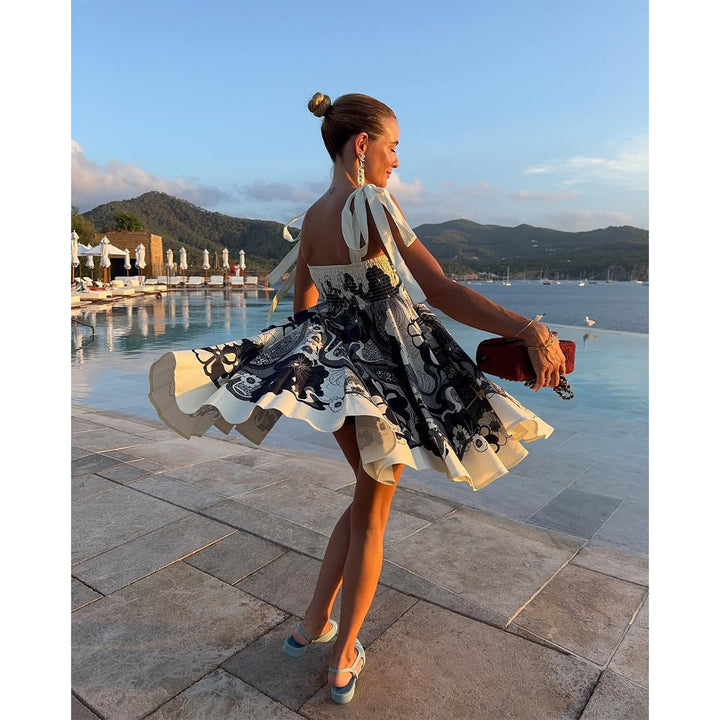 Women's summery mini dress with playful pattern mix and flowy cut Skovae