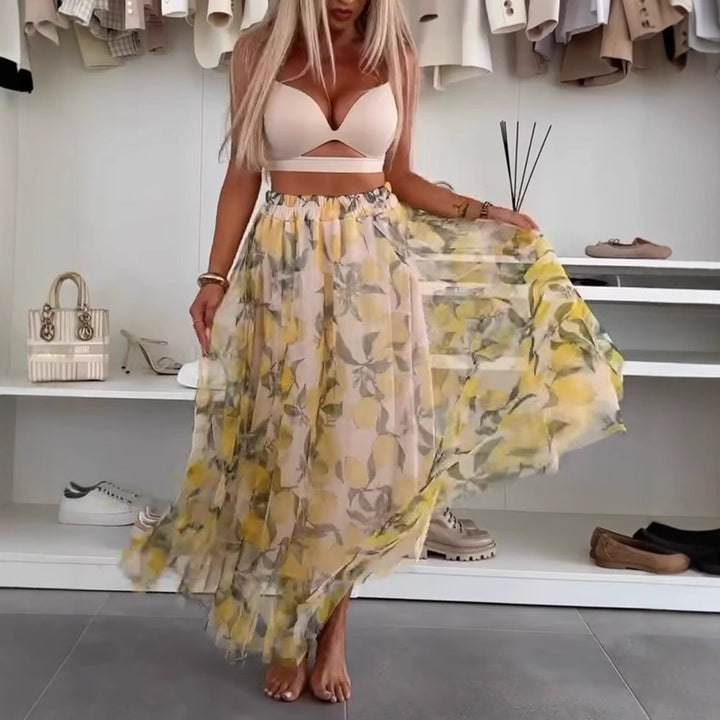 Dame maxi nederdel lavet af let chiffon med blomstermønster Stilla