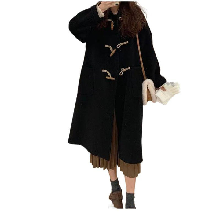 Kvinders Duffle Coat med praktiske lommer og dekorative træ toggles.