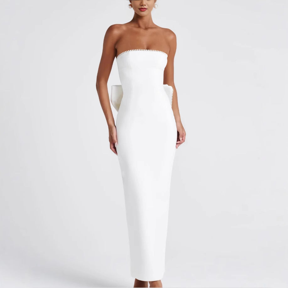 Dame Maxi-kjole med off-shoulder design og elegant flæsekant Stilla