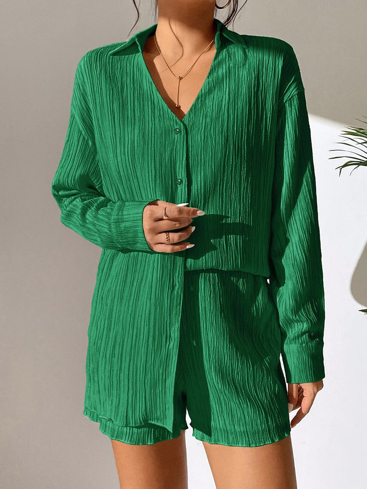 Dame afslappet kortærmet jumpsuit med struktureret overflade og elegant V-udskæring Stilla
