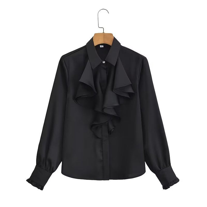 Damebluse med voluminøse flæser og elegant snit Stilla