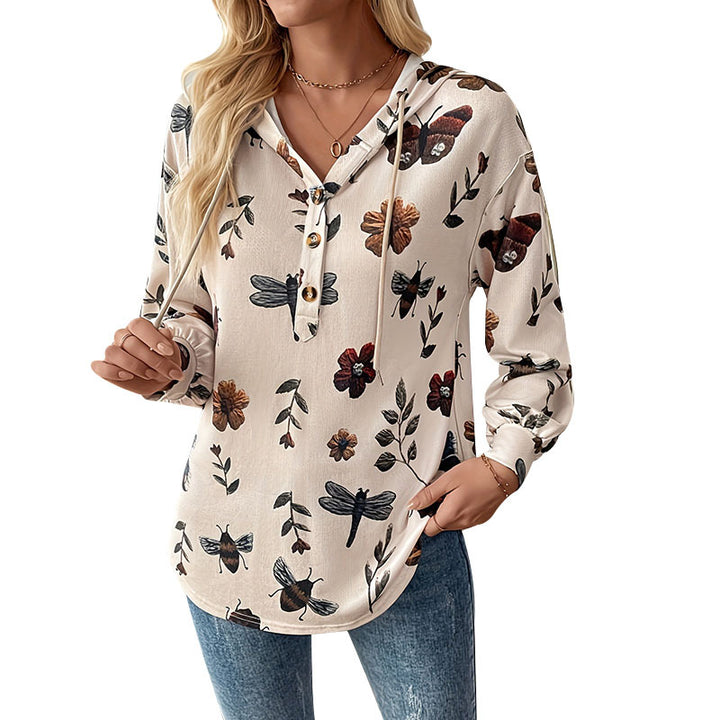 Damebluse med blomsterprint og funktionelt knapdetalje med hætte Stilla