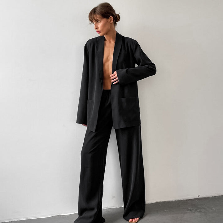 Damer elegant blazer- og bukseensemble med svingende snit og praktiske lommer Stilla