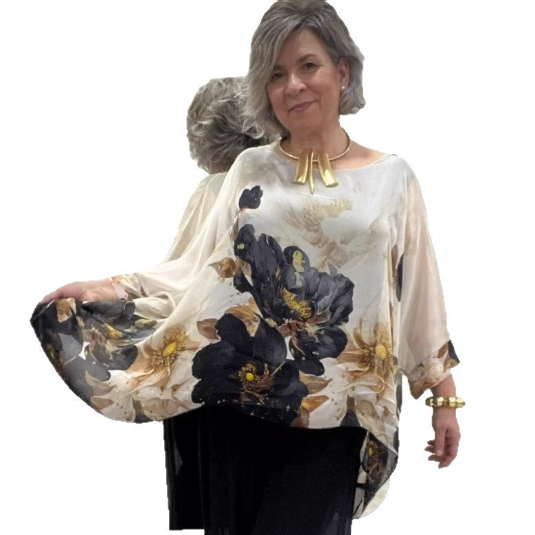 Damebluse med florale accenter og voluminøse ærmer Stilla
