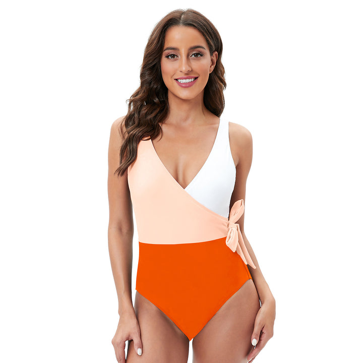 Dame enhed badedragt med moderigtigt omslag design og sidelæns binding accent Stilla