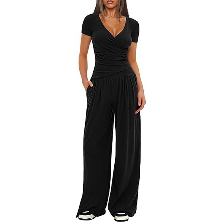 Dame afslappet jumpsuit med omslagsdesign og bredt ben Skovae