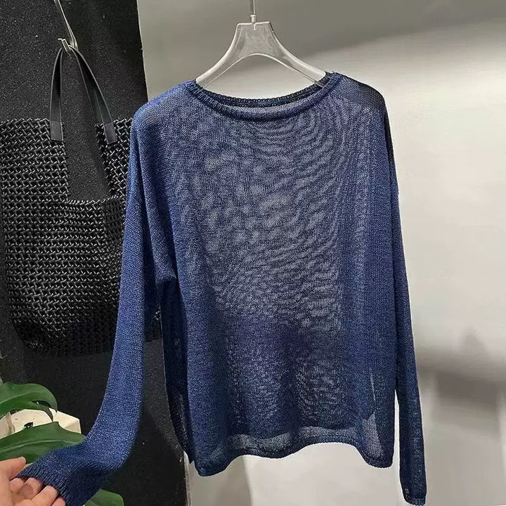 Dame afslappet, gennemsigtig sweater med løs pasform og fint strikmønster Stilla