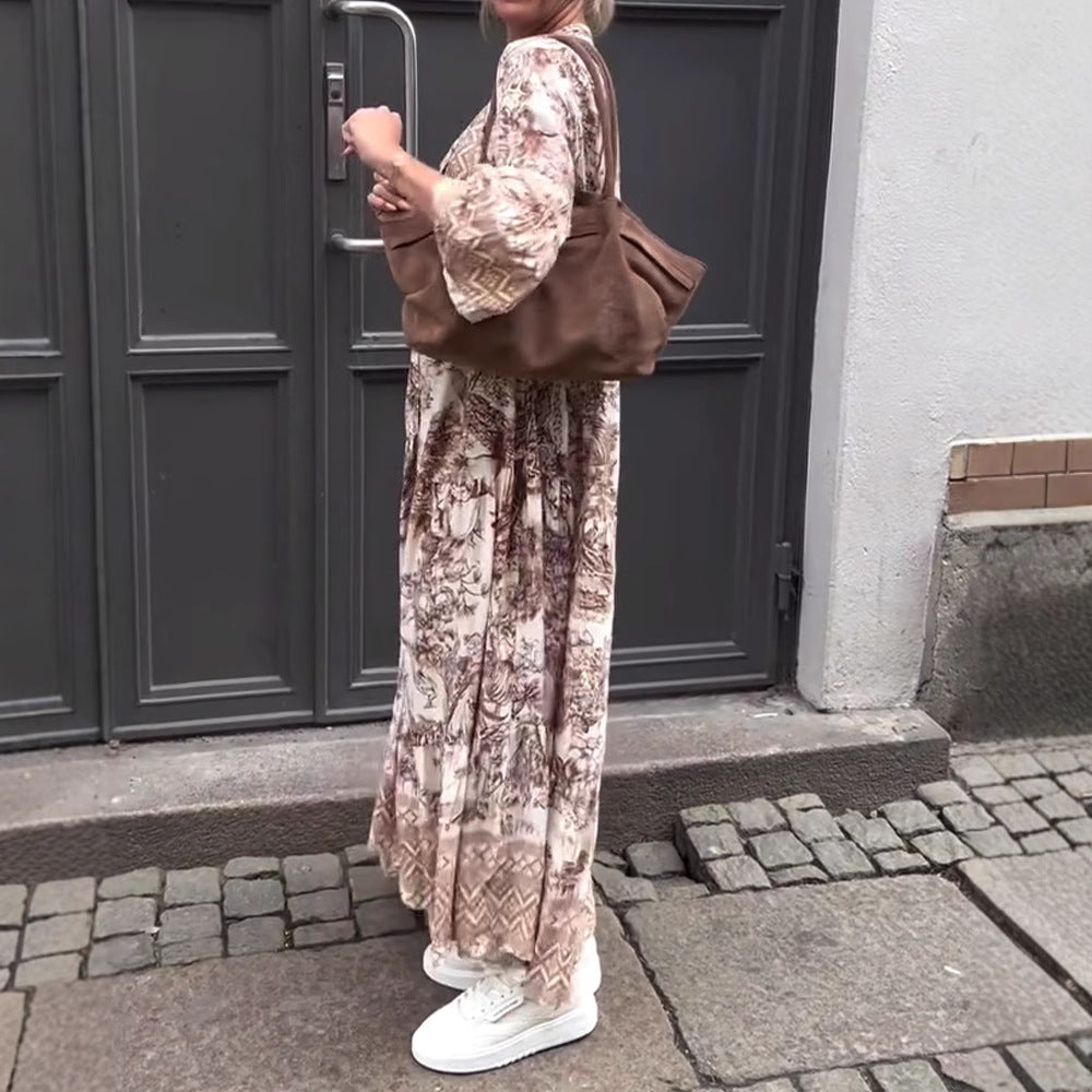 Dame Maxikjole med voluminøse ærmer og elegant mønster Stilla