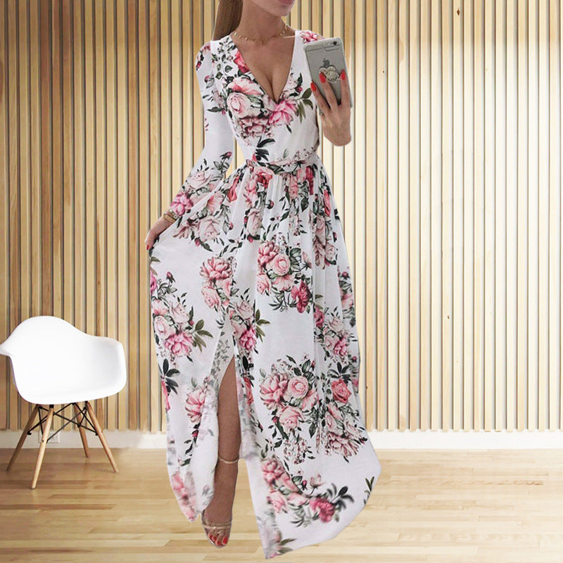 Damer blomst design maxikjole med dyb slids og elegant indpakningslook Stilla