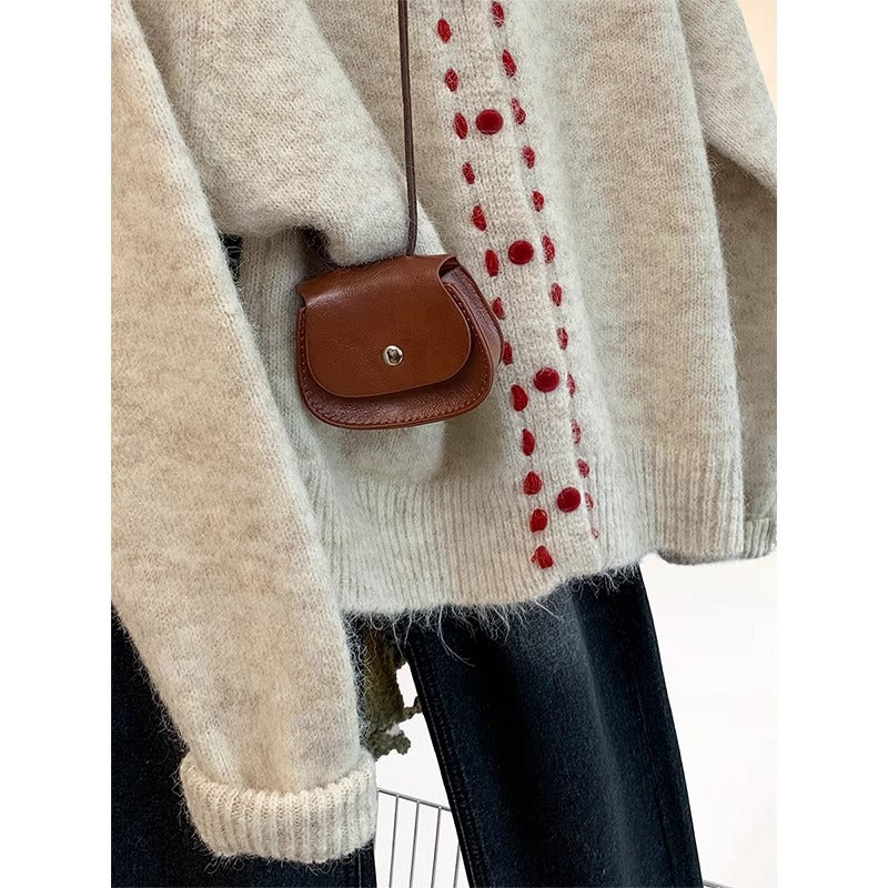 Dame Cozy Knit Sweater med farverig knapdetalje Stilla