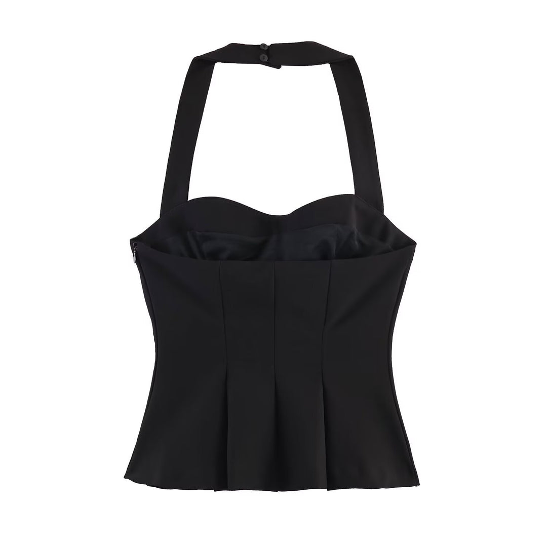 Dame halterneck-top med elegant taljesnit og fine plisseedetaljer Skovae