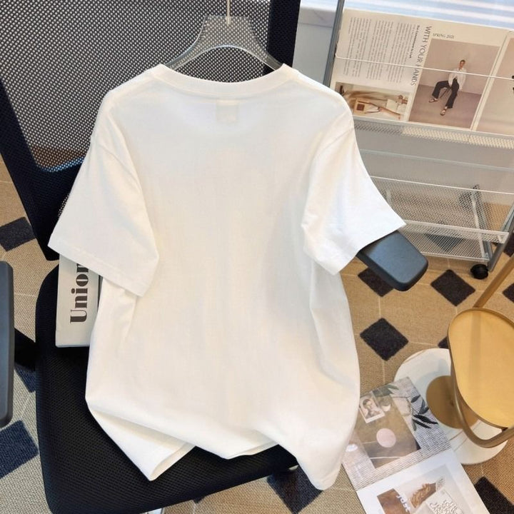 Dame T-shirt med moderne grafikprint og afslappet snit Stilla