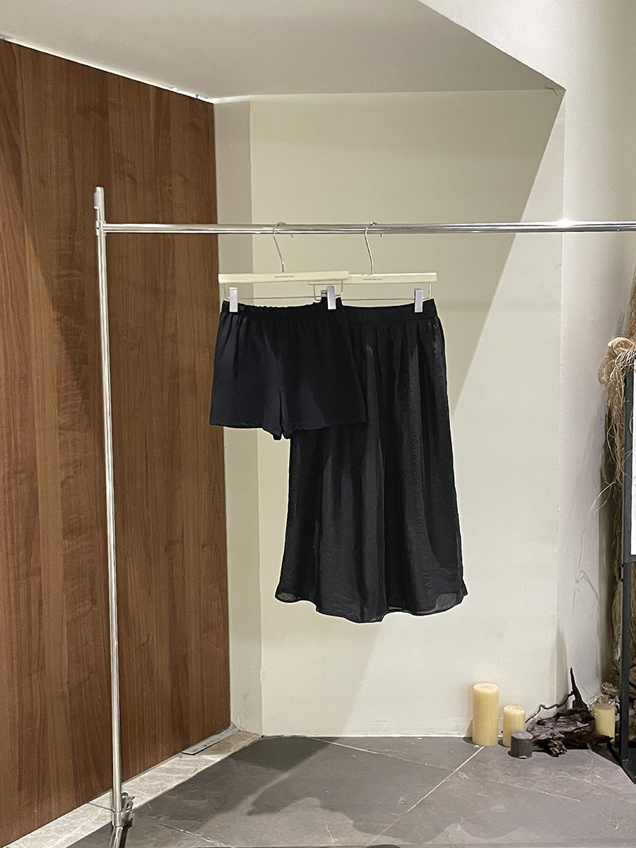 Dame alsidigt shorts- og nederdelssæt lavet af flydende stof med elastisk talje Stilla