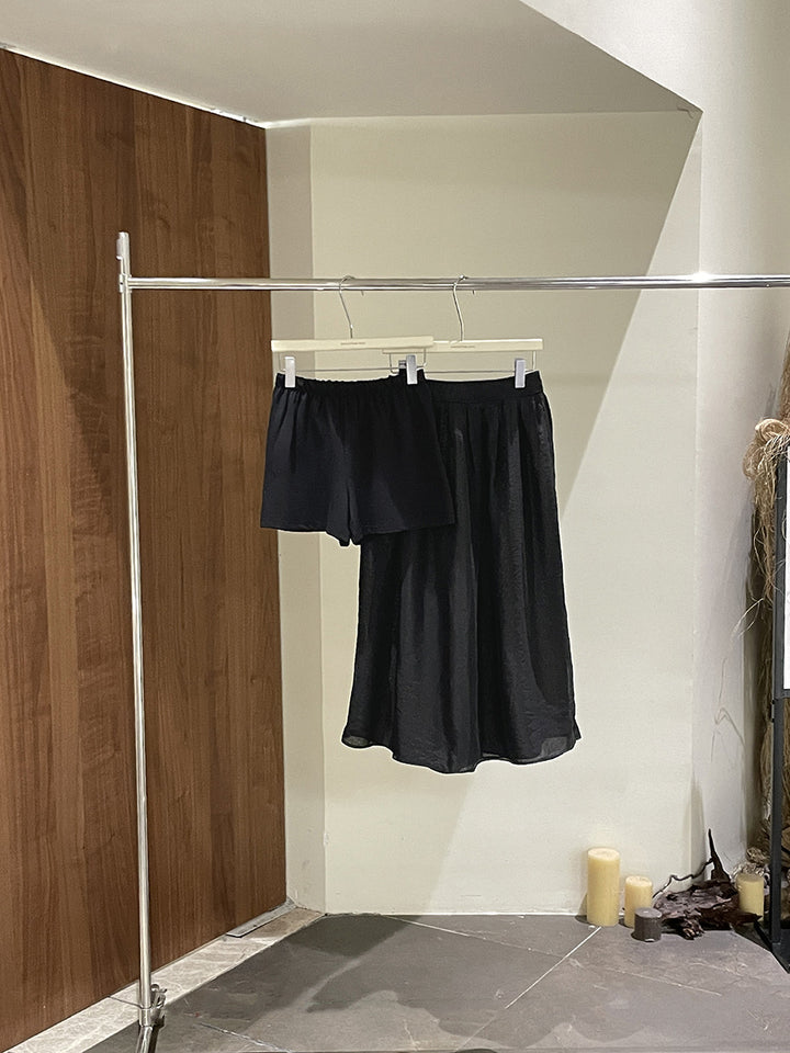 Dame alsidigt shorts- og nederdelssæt lavet af flydende stof med elastisk talje Stilla