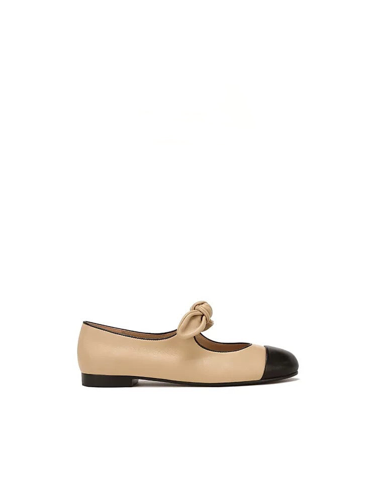 Dameballerinas med fashionable sløjfede accenter og elegant tofarvet udseende Stilla