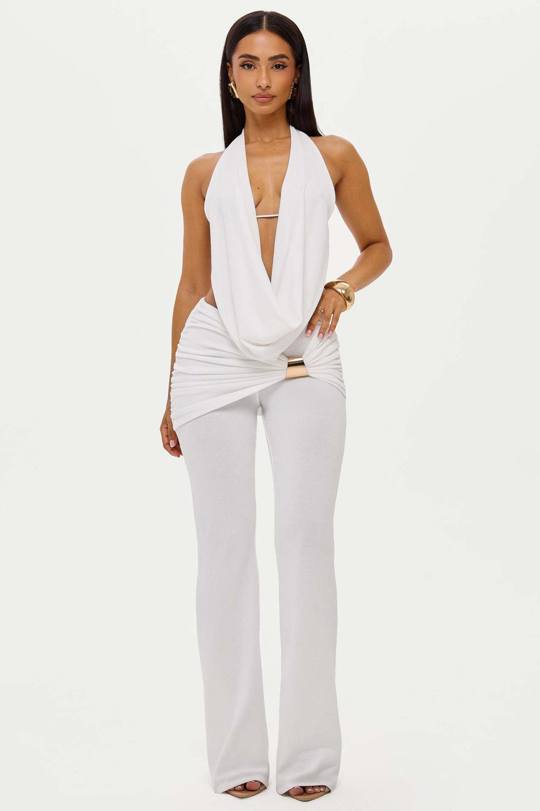 Dame elegant, tætsiddende jumpsuit med dyb udskæring og vidde ben Skovae
