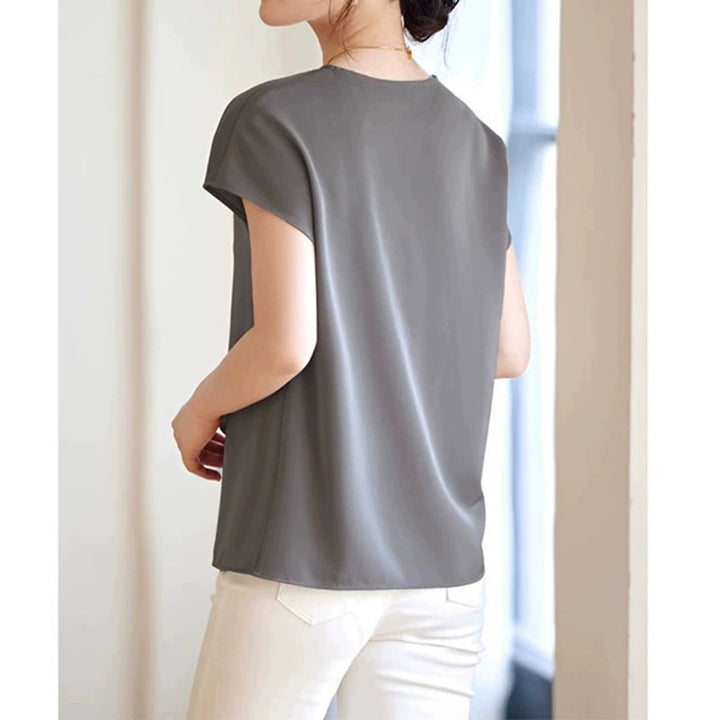 Damebluse med elegant viklook Stilla
