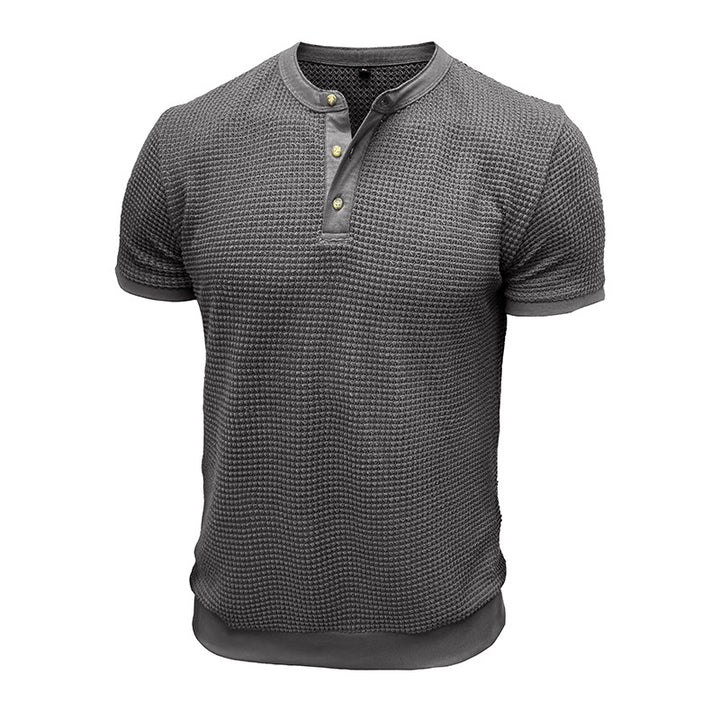Herre kortærmet Henley-shirt med struktureret design og elegant knaplukning Stilla
