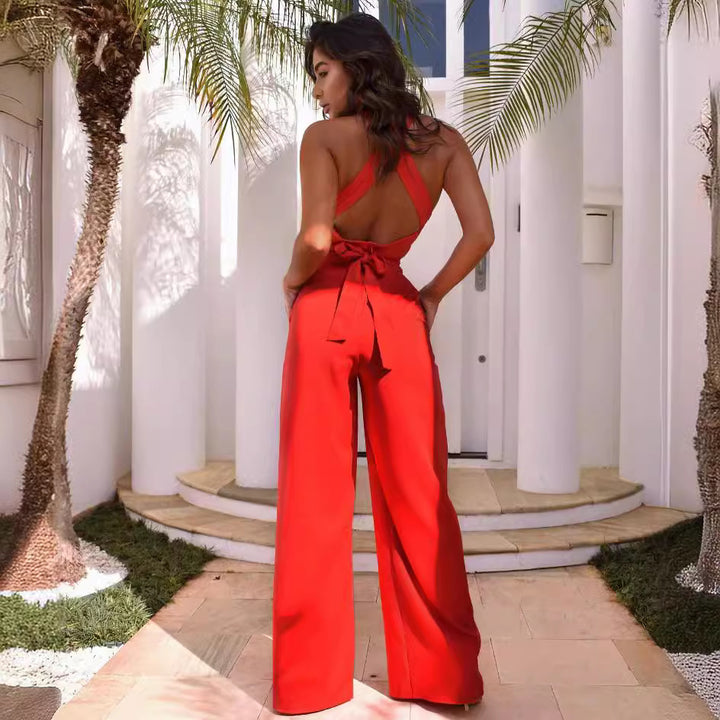 Dame jumpsuit med sexy cut-outs og elegant indpakningsdesign Stilla
