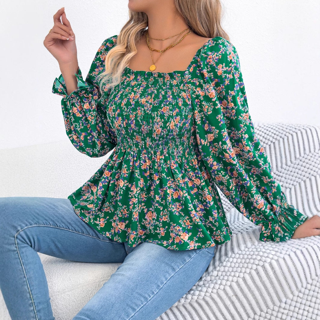 Damebluse med bred pasform og florale detaljer Stilla