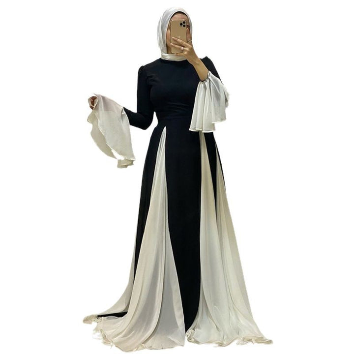 Dame elegant maxikjole med asymmetrisk skørt og voluminøse ærmer Stilla