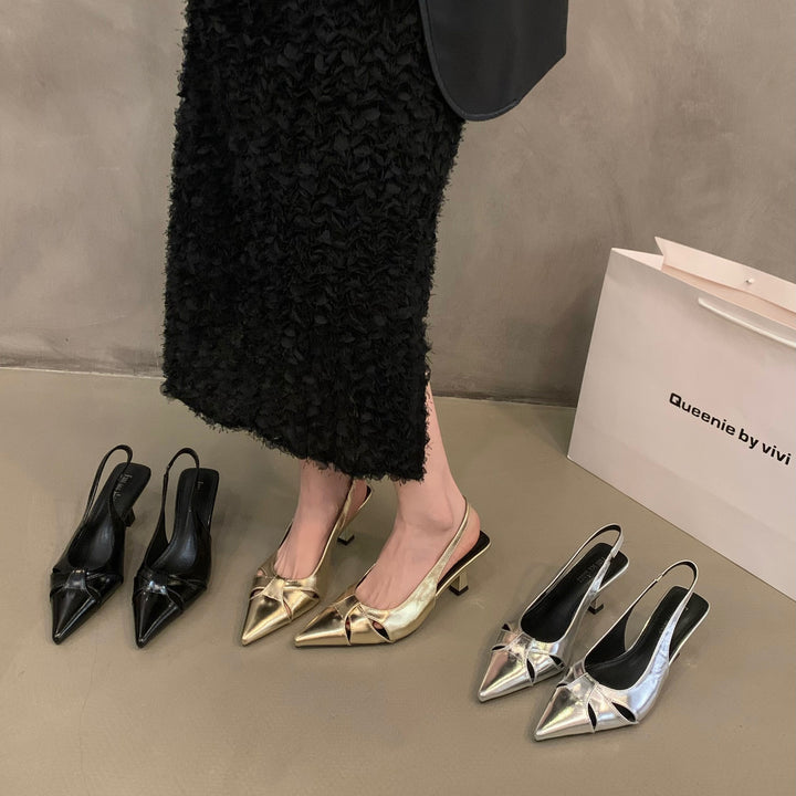 Dame Slingback-pumps med spids tåområde og dekorativt sløjfedesign Stilla