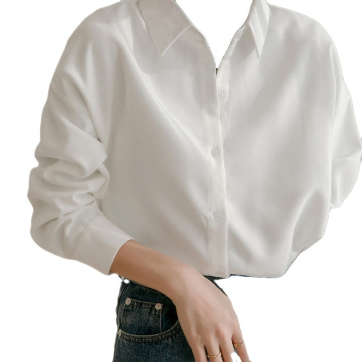 Kvinders oversized bluse med elegant krave og afslappet pasform Stilla