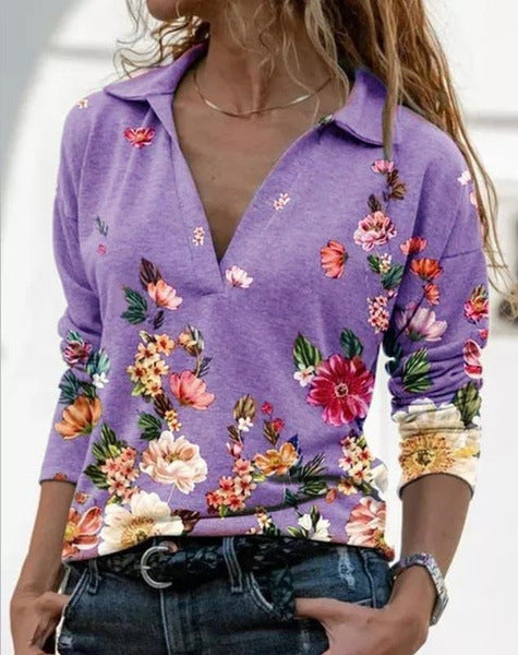 Damebluse med blomsterdesign og polo-krave Stilla