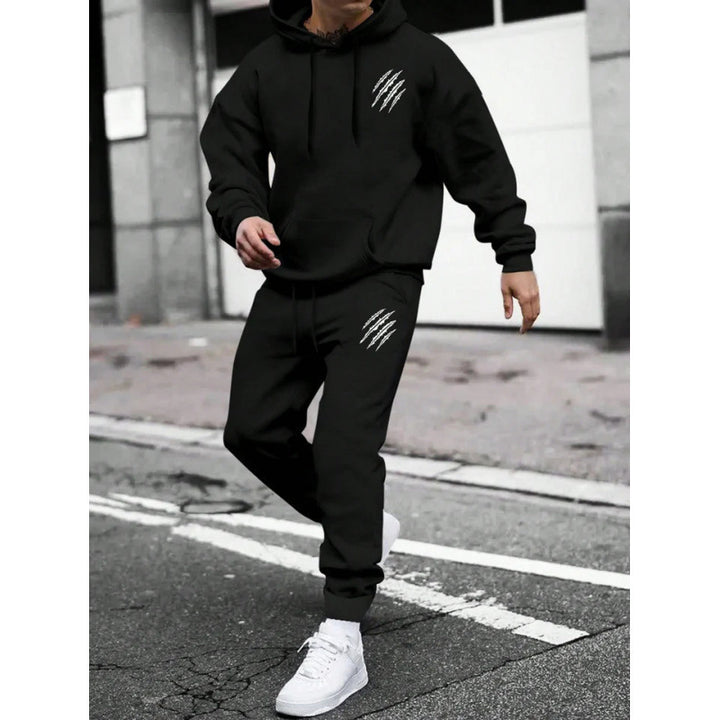 Herre hoodie tracksuit med kreative grafik og komfortabel pasform Skovae