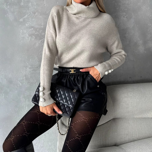 Kvinders høj-kvalitets turtleneck striktrøje med elegante knapdetaljer Stilla