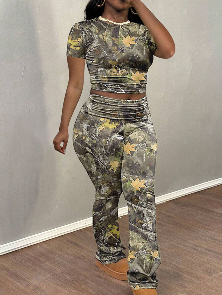 Dame fritidsdragt med floral camouflage-design Stilla