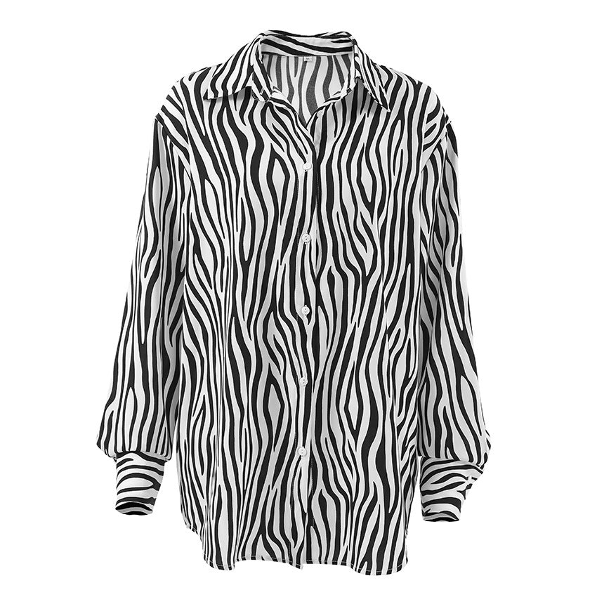 Damebluse med zebra-print og moderne snit Stilla