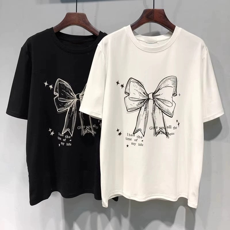 Dame T-shirt med legende båndmotiv og inspirerende slogan Stilla