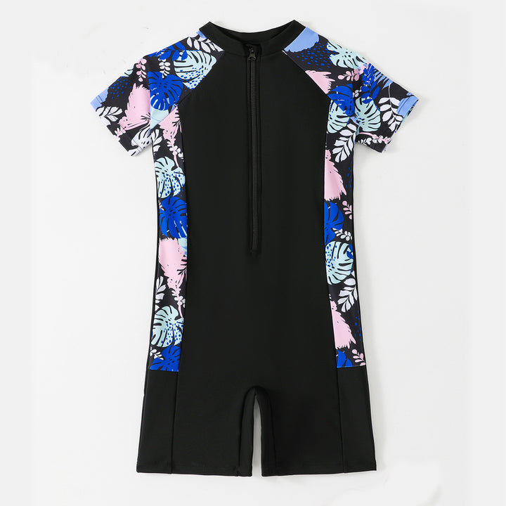 Dame én-delt surfdragt med blomsterdesign og kort snit Stilla