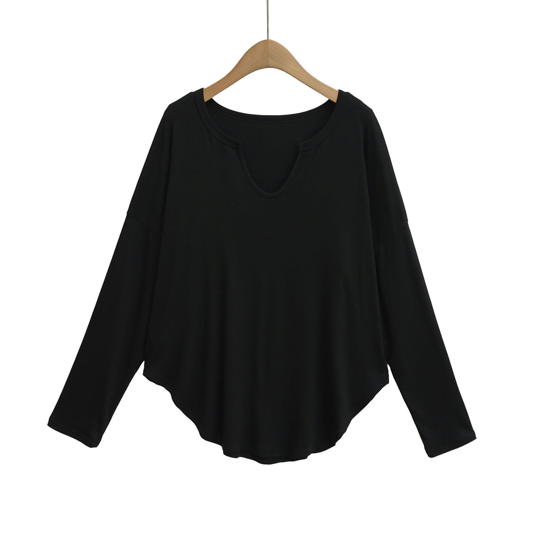 Dame afslappet longsleeve top med dyb v-hals og løstsiddende snit Stilla